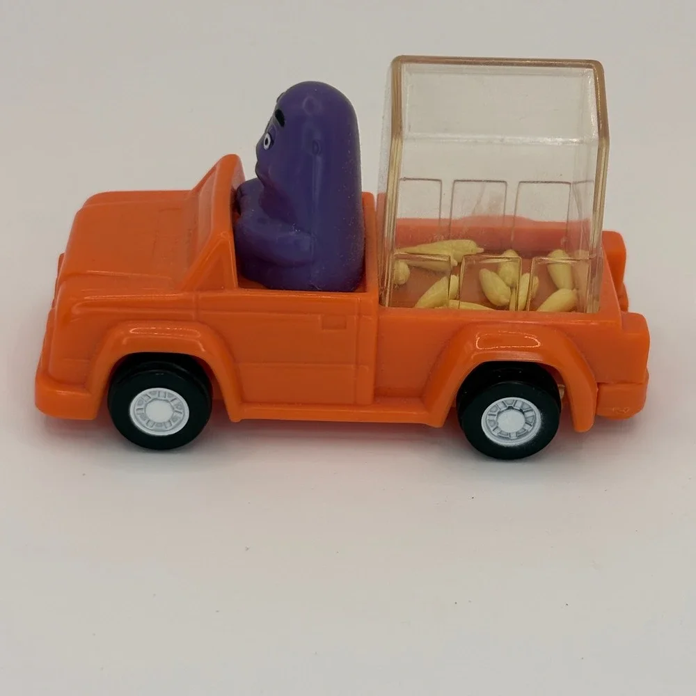 Vintage 1995 McDonalds Happy Meal Toy Grimace Orange Pickup Truck Corn Rattle